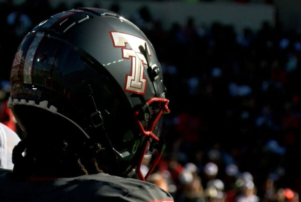 Close-up of a Texas Tech football helmet with the “Double T” logo